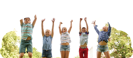 friendship, childhood, leisure and people concept - group of happy kids or friends jumping up and having fun in summer park